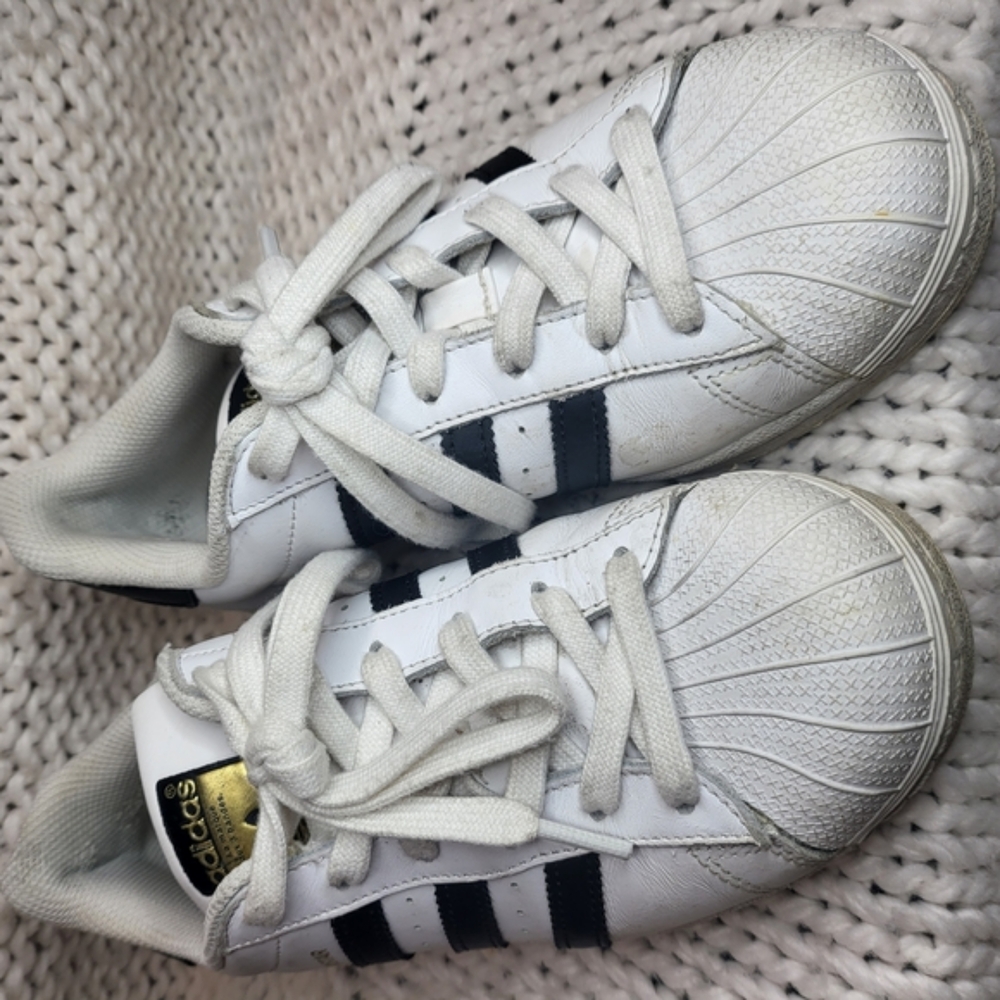 Adidas White and Black Athletic Shoes with Iconic Shell Toe